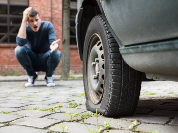 WHAT TO DO WHEN YOU GET A FLAT TIRE
