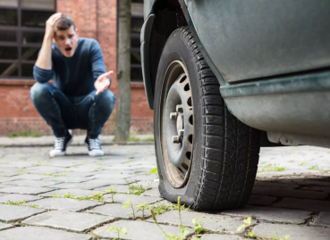 WHAT TO DO WHEN YOU GET A FLAT TIRE
