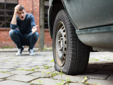 WHAT TO DO WHEN YOU GET A FLAT TIRE